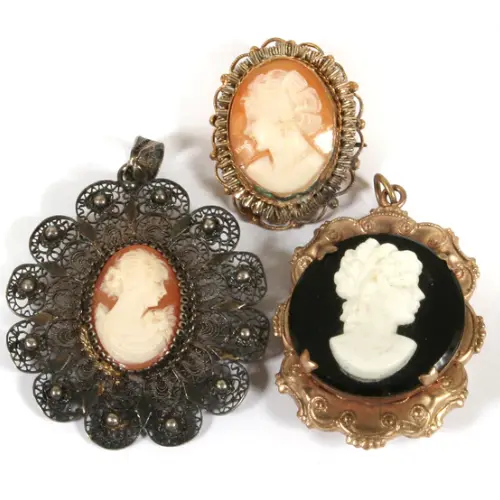 Regency era carved cameo lockets